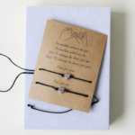 black string bracelet with hearts back