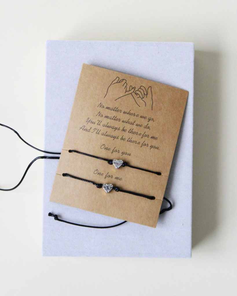 black string bracelet with hearts back